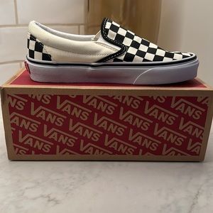 Brand new never worn classic vans slip-on. White & Black. Size 5 women/3.5 men.
